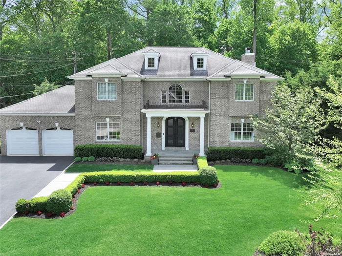 Built in 2008, this designer showplace is stylish & chic offering incredible entertaining spaces Through Out To Enjoy With Family & Friends. Step into the grand foyer with a soaring double height ceiling & sweeping staircase. The cozy living room with a bespoke built in bar & a formal dining room offers A Lovely architectural Ceiling treatment plus gorgeous herringbone wood floors, which set the tone for this very special home. A beautiful, newly updated gourmet kitchen offers high end appliances plus an oversized carrara marble & butcher block island .The Spacious Open Concept kitchen flows into the breakfast room & sun drenched family room with Sonos & Home Theatre With fireplace & coffered ceiling detail. Enjoy your own private oasis with gardens, a heated gunite pool w/Sun Deck , waterfll & dramatic dual fire pits to enjoy on summer evenings . Enjoy A Astro Turfed Area For Recreation, Full House Generator.2 Car Garage W/ Car Lift & So Much More .