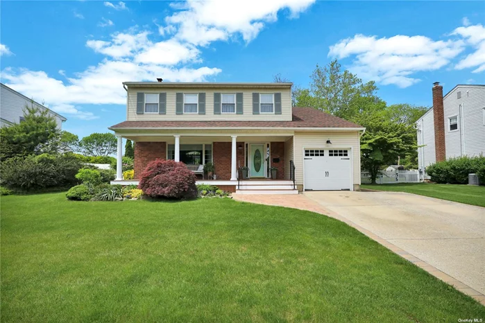 New to the market lovely and meticulously maintained expanded 4 bed 21/2 bath colonial with a great mid block location.Oversized property (141&rsquo; deep) fully landscaped, fenced in yard, maintenance free deck, paver brick patio, natural gas BBQ hook up.The interior has gleaming hardwood floors, newer windows, formal living room, expanded formal dining room with high architectural ceiling, expanded eat in kitchen with white shaker wood cabinets, designer appliances including gas range & SS exhaust, granite counters, pantry, new guest powder room, expanded family room w/gas burning fireplace, large windows, sliders to rear patio and high architectural ceiling. The 2nd floor has 4 large bedrooms including the primary with ensuite bath, WI closet and additional double closet, 3 additional bedrms. plus full bath.The lower level basement has plenty of space for a rec area, gas boiler, separate HW heater, & storage. Roof approx 5 years old, 1 car garage, charming front porch & underground sprinklers