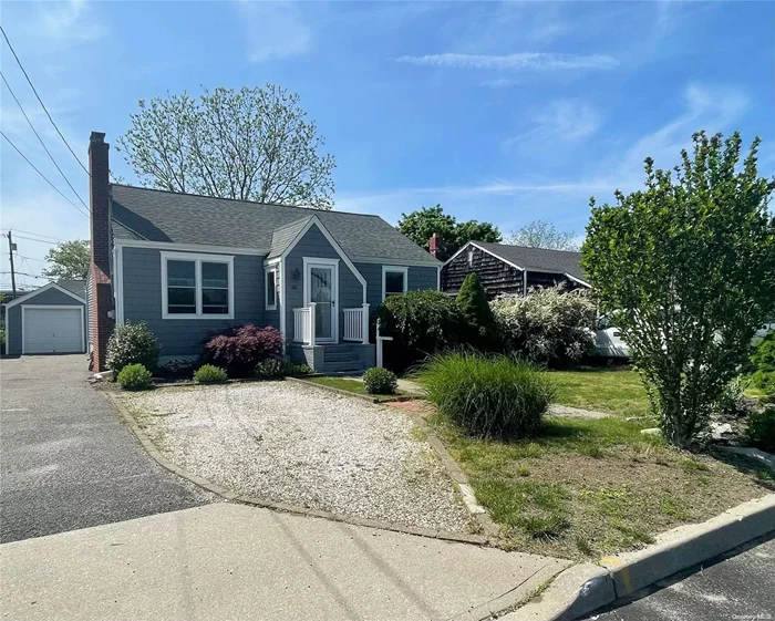 Charming 2 bedroom, 2 full bath ranch in the heart of Islip. Featuring hardwood floors, wood burning fireplace,  eat-in kitchen, and bonus office/possible 3rd bedroom. New siding and Anderson windows and doors completed in 2021. Full unfinished basement and walk to town. Convenient commute to NYC, close to beach, and ferries to Fire Island.