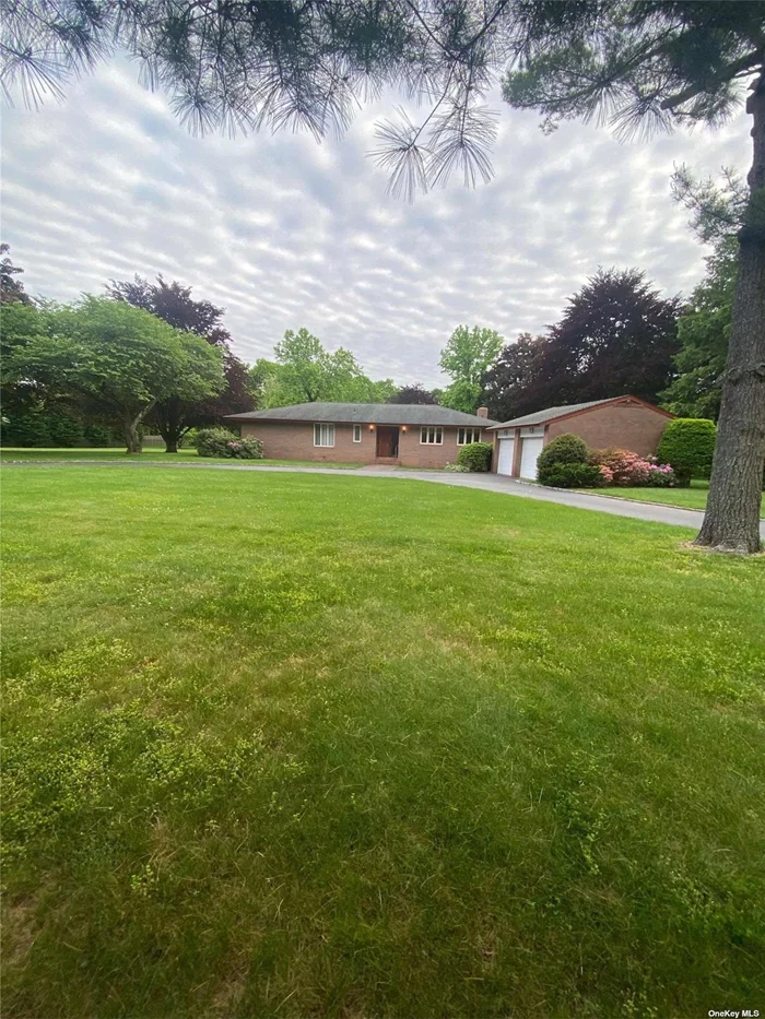 3 bedroom 2 bath ranch on one of the best 2 acre lots in Muttontown. Renovate existing house or build your dream home on this unique lot that is located around the corner from the center of Syosset yet feels miles away. Syosset Schools.