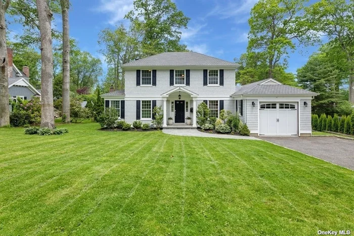 Located in one of the most sought after villages on the North Shore this 4 Bedroom Classic Shingled Center Hall Colonial is located in the beautiful village of Plandome. Completely rebuilt & expanded in 2012 this charming & timeless design offers a Gourmet Bespoke Kitchen with oversized island with one of two sinks for ease all overlooking the great room with wood burning fireplace & custom built-ins. The sun drenched breakfast room looks out onto the lush property and patio which will be enjoyed all summer for outdoor entertaining. A formal dining room, living room, powder room, walk-in pantry, laundry room, office & mudroom complete the first floor.. The 2nd level offers a spacious primary suite with two spacious custom walk-in closets, a primary spa like marble bathroom w jacuzzi tub, shower & custom vanity, plus three additional bedrooms & full bath with wainscoting detailing & a lovely vanity w/ marble top. 28 min train to NYC with parking & Plandome Village Tennis & Park w fee.