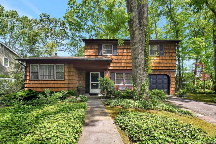 Opportunity Knocks on this sizable home in need of a new owner. Public records indicate that this is a spilt level house, but it is not a traditional split level house. As you enter into the foyer you will feel like you are in a center hall colonial, as you can see in the attached floor plan. Every room in the house is spacious. There are hardwood floors beneath the existing carpet in the LR, and all the bedrooms. The house is heated with oil however there is a gas stove. If privacy is what you are looking for this house sits mid block across from a wooded town area. No neighbors across the street. This charmer has endless possibilities. Don&rsquo;t wait to see it!