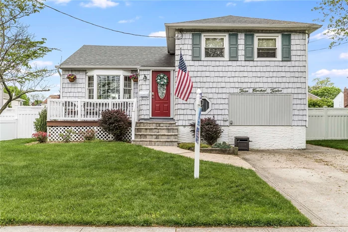 Lovely 3 Bedroom 2 Bath Split Level facing the most desirable Inwood country club nestled on a quiet dead end block. Sun drenched Living Room with Vaulted Ceilings, Hardwood Floors and Large Deck off kitchen.