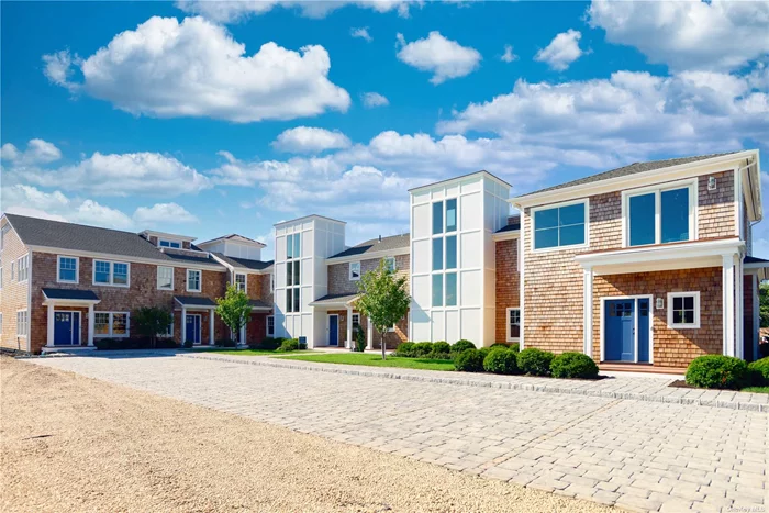 Welcome to this stunning townhouse in Hampton Bays, NY! This 3-story townhouse offers a perfect blend of coastal living and modern luxury. The first floor features a convenient bedroom and a full bathroom, providing flexible living options. The second floor boasts two en-suite bedrooms, each with access to a second-story deck, allowing you to enjoy the refreshing bay breeze. The interior is adorned with top-notch features, including a natural gas fireplace and a dry bar in the living room, creating an ideal setting for relaxation and entertainment. The 32&rsquo; natural light-filled stairway adds an elegant touch and enhances the sense of spaciousness throughout the home. Step outside to discover the impressive exterior features. The private first-level patio is perfect for al fresco dining or simply unwinding in the fresh air. Ascend to the second-story deck, which leads to the crown jewel of this home - a third-level roof deck offering breathtaking views of Shinnecock Bay and Dune Road. Imagine sipping your morning coffee or hosting gatherings against this picturesque backdrop.