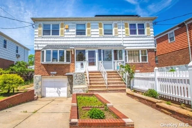 Beautiful Exposure South Sun-Soaked Sd Colonial In North Flushing, R3-1 Zoning, Living Room , Dining Room,  Kitchen, 4 Bedrooms, 2.5 Baths, Large Deck, Finished Basement with Separate Entrance, Attached Garage, Courtyard. PS 21, JHS 185. Convenient All.