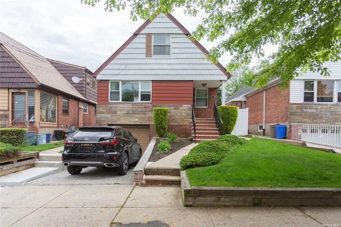 Solid Brick In Fresh Meadows, 3 Floors, Garage & Private Driveway, Impeccably Maintained And Is In Excellent Move-In Condition. 4 Bedrooms, 2 Full Bathrooms, And 1 Half Bath. Large Back Yard.