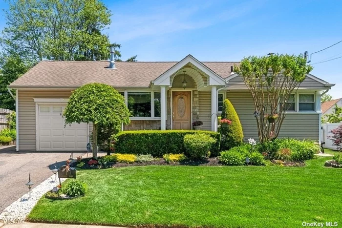 Beautiful 4 Bedroom Renovated Ranch located in the prime location of Syosset Village with close proximity to LIRR, Shopping and Syosset Schools. The updated open concept kitchen has custom cabinets, granite countertops and stainless-steel appliances. The sitting room off the kitchen leads to the oversized sunroom with sliding doors to the backyard patio. Offering a 1st floor primary bedroom, full bathroom & two more bedrooms. The 4th bedroom located on the 2nd floor is versatile enough to be used as a guest room or office. The basement houses the laundry room, ample storage and utilities.Updated Roof, Siding, Pavers, IGS Fully fenced yard and year round curb appeal - no detail overlooked! Village Elementary, Southwoods Middle, Syosset HS.