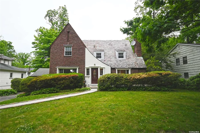 Picturesque Brick Tudor With Vermont Slate Roof On A Desirable Quiet Cul-de-Sac and Total Privacy with Lush Flat Property. This True Charming Home Featuring Four Bedrooms, Three Full Bathrooms, Spacious Living Room with Fireplace, Formal Dining Room, Granite Eat-In-Kitchen. Gas Heat and Central Air Conditioning. Baker Hill Elementary School and Great Neck North Middle and High Schools. Enjoy all the Amenities of Great Neck Park District.