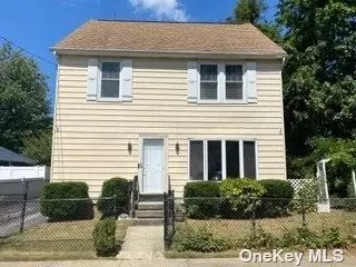 Incredible Opportunity! Large Expanded Colonial with 5 Spacious Bedrooms all Located on Second Floor, Huge Family Room Addition & an Expansive Backyard with 2 Car Garage. This Colonial is Located on a Beautiful Tree Lined Street in the College Section of the Village of Williston Park. Bright & Sunny Living Room Open to the Kitchen and Dinette Area, Large Formal Dining Room, Family Room with Full Bath & Sliders that Lead to a Great Deck for Entertaining & Relaxing. The Second Level has Plenty of Room for Everyone with 5 Bedrooms & Full Bathroom. Additionally, There is a Wide Staircase Leading to a Full Attic with 4 Windows.. This Home is Located Near the Town Pool, Park, Shops, Train, Bus, Highway & Hospital.