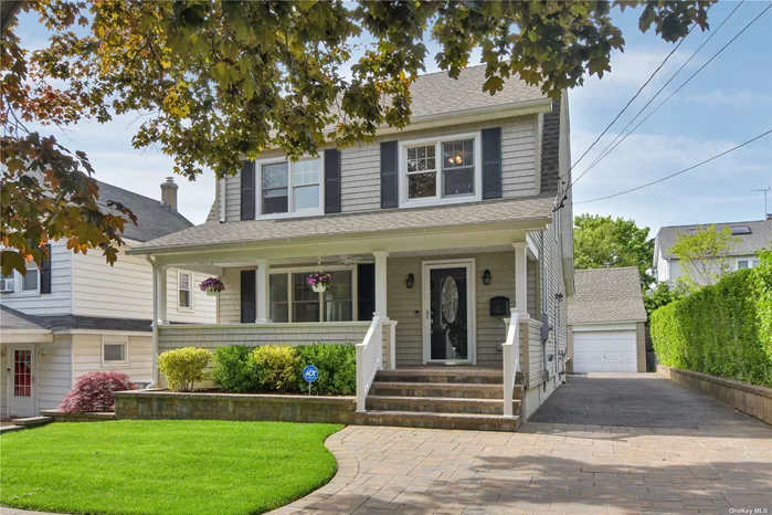 Perfectly positioned, beautifully updated front porch Colonial with wonderful updates and generous living space.