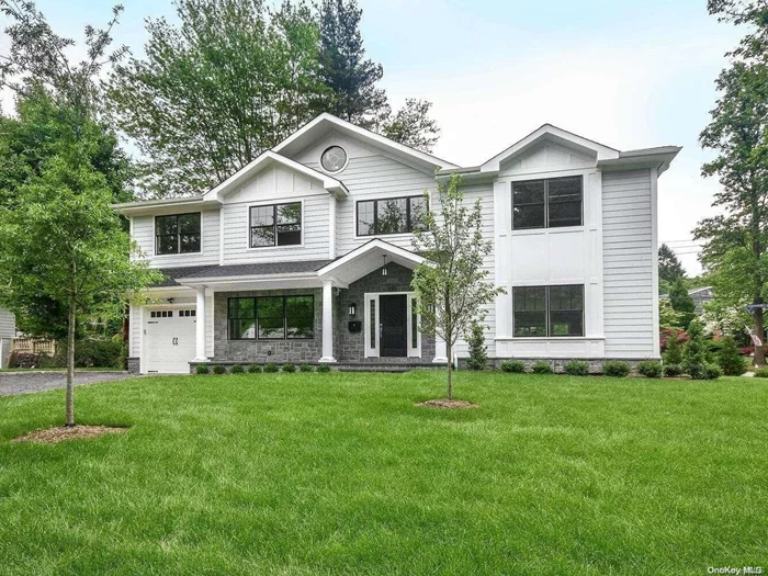 Stunning new construction in the heart of Flower Hill. This CH Colonial boasts 6 BRS 5.5 BTHS. Dramatic 2-story entry w/grand stairway opens to spacious LR, FDR, gourmet kitchen w/quartz countertops+bkfst area, family rm w/gas fpl, office/BR w/full bath, & pwdr rm complete main level. 2nd flr primary BR w/luxury bath, 2nd BR w/jack&jill bath, +2 addtl BRS w/hall bath. Large finished basement w/full bath & outside entrance, one-car attached garage.