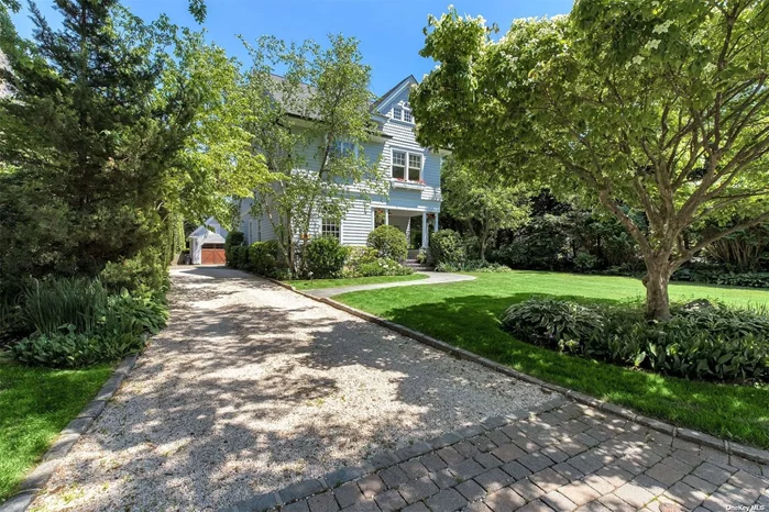 This 5 bedroom, 4.5 bath Plandome colonial has been masterfully gut renovated and expanded in 2006 offering beautiful bespoke architectural details. Blending the charm & spirit of true American Architecture with the modern flavor of todays living with an open kitchen to family room featuring a beautiful gas fireplace. This charming renovated eat in kitchen boasts custom cabinetry, gorgeous copper sinks, a large island with seating for 4 and state of the art appliances. The sun drenched breakfast room features french doors that open to your private & serene landscaped property. A formal dining room, living room with f/p, office, mudroom & powder room complete the first floor. The second level offers a primary suite, two additional bedrooms en suite & laundry room and an additional two bedrooms and one bath, & storage complete the third floor. The finished lower level provides plenty of recreational space. Beach/mooring & tennis plus Plandome Sticker for Train Parking with fee.