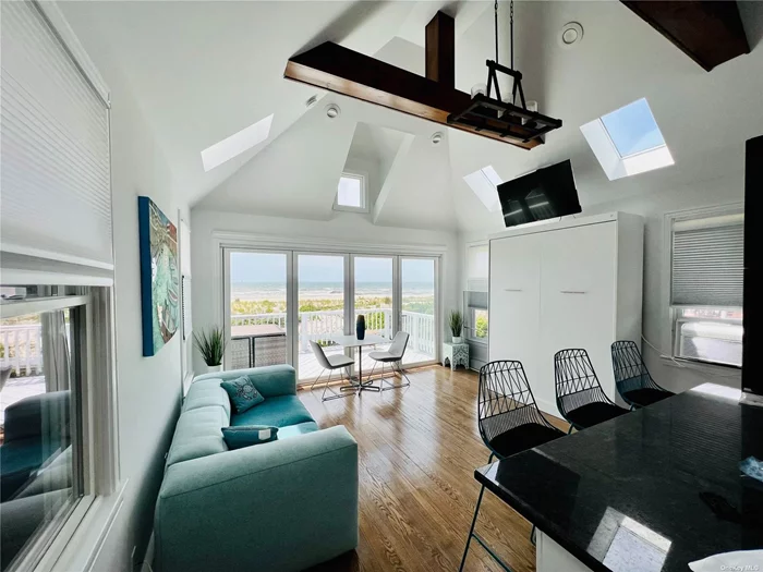 Stunning Direct Oceanfront Studio in the Trendy west end. Newly Renovated. Spectacular ocean views from your private deck. Granite counters, vaulted ceiling murphy bed. Enjoy your summer style living all year round.