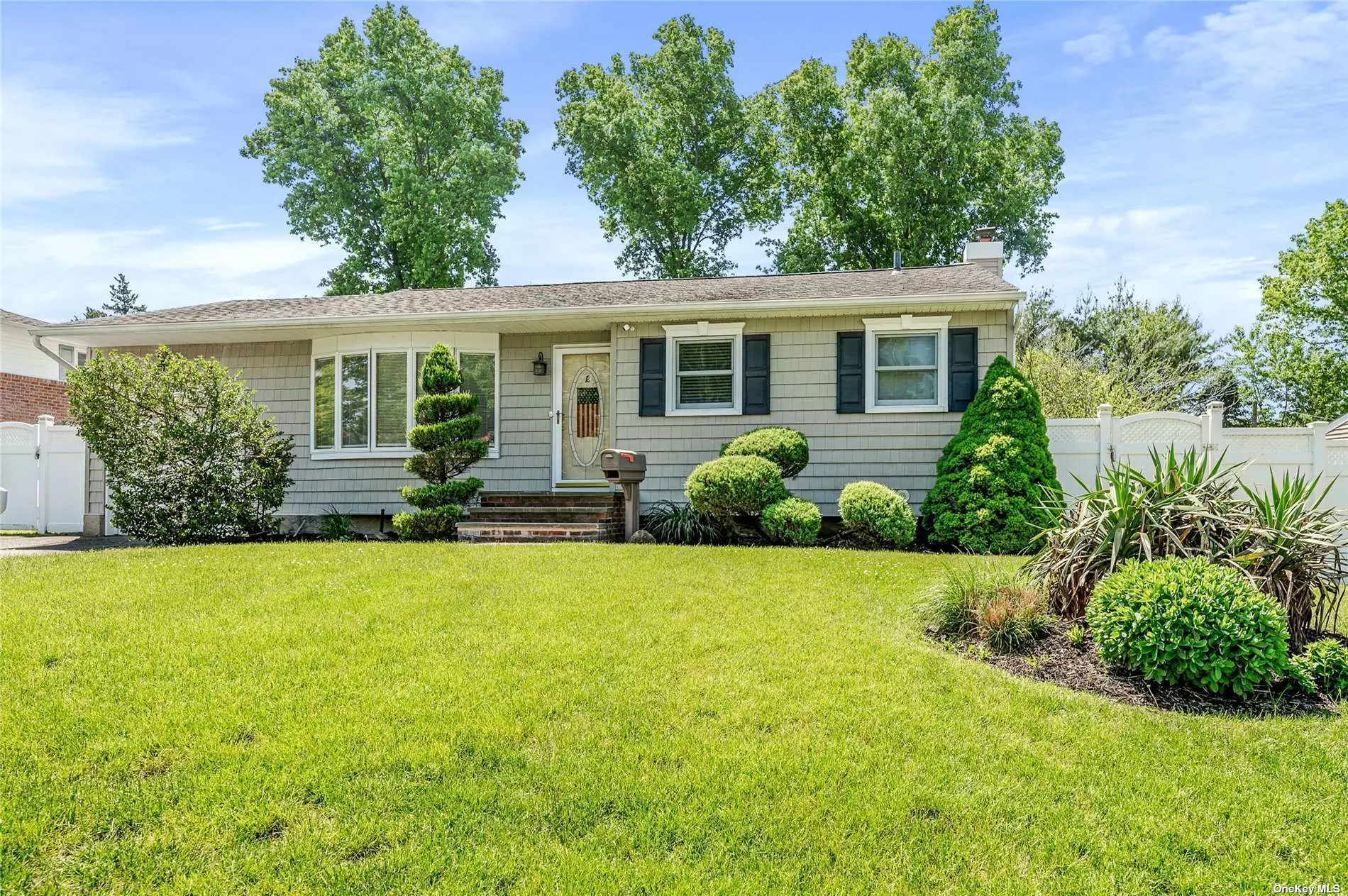 Welcome to 12 Wyoming Street. This warm and inviting 3-bedroom Ranch features new flooring throughout the home and updated bathrooms. An open layout offering a large bay window flooding the home with Natural Sunlight. Head on down to this spacious lower level for a fun movie night. In addition, there is plenty of storage plus laundry/utility room. We saved the best for last... a fully fenced yard with your very own L-Shaped Inground pool; the perfect spot for entertaining all summer long! Call for your private tour.