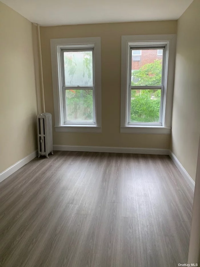 Just renovated 1st floor apartment: Living Room, Dining Area, Eat In Kitchen, 2 Bedrooms, 1 Bathroom. New hardwood floors, freshly painted, new kitchen and bathroom. Street Parking. Heat is included. Tenant only pays for cooking gas and electricity.