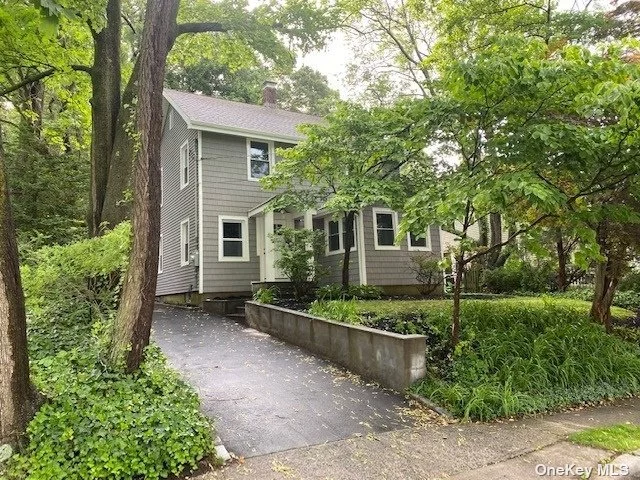 Charming in town colonial, mint condition, quartz countertops,  refinished hardwood floors, just painted and resided. Must see best buy in Oyster Bay.