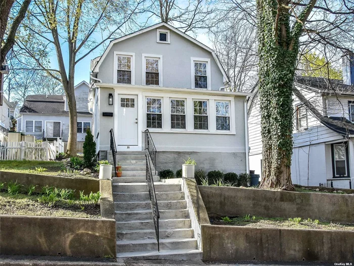 Vintage Victorian beautifully redone-bright and open with original cottage charm intact. New eat in kitchen with island and stainless steel appliances. New windows add amazing light, natural finished wood flooring and glass stair railing are a designer touch. Renovated full bath and new powder room on first floor. Park across from the house features a meandering brook and offers serene and tranquil green space. Close to RR, shopping and waterfront activities.