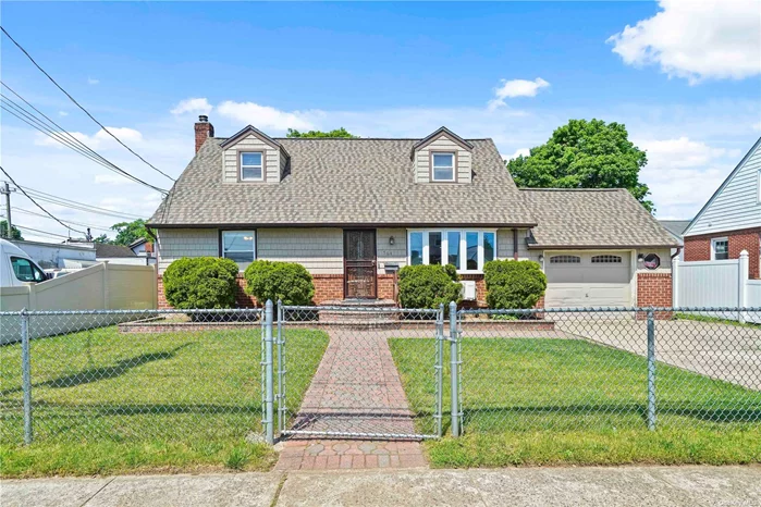 Take a look at this gem! This charming home lies centrally located on Long Island and is just minutes from Hofstra University, Adelphi University, Garden City shopping and Roosevelt Field Mall. This property sits on a 6000 square-foot lot and boasts 4 bedrooms, an additional walk-out basement space for a family member, and a full living-room, dining-room and den. The kitchen was renovated just last year and is simply breathtaking. Are you looking for a cozy single family home with Low Taxes? Then this one is for you!