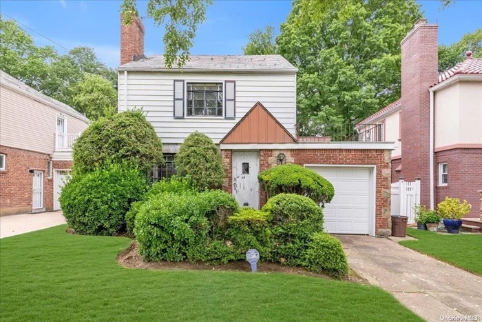 Detached tudor tucked into lovely Hollis Hills with amazing yard! Close proximity to P.S. 188, stores and transportation. This 2 bedroom house needs updating.