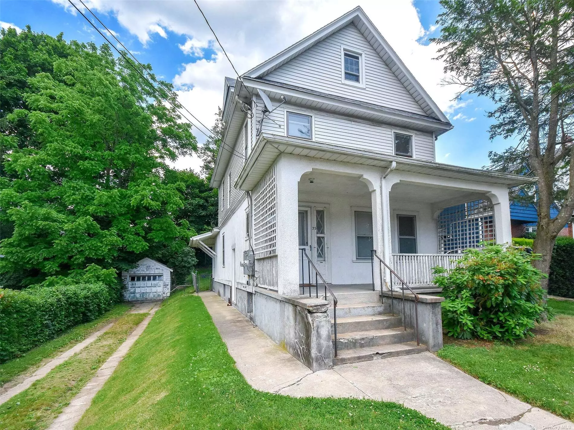 Great opportunity for Investors or end users to own a legal 2 family home just minutes to town, train, shops etc. Bring your imagination and consider turning this into a special single family home or an income producing investment property. Lovely quiet dead end street, oversized property in a mid block location.