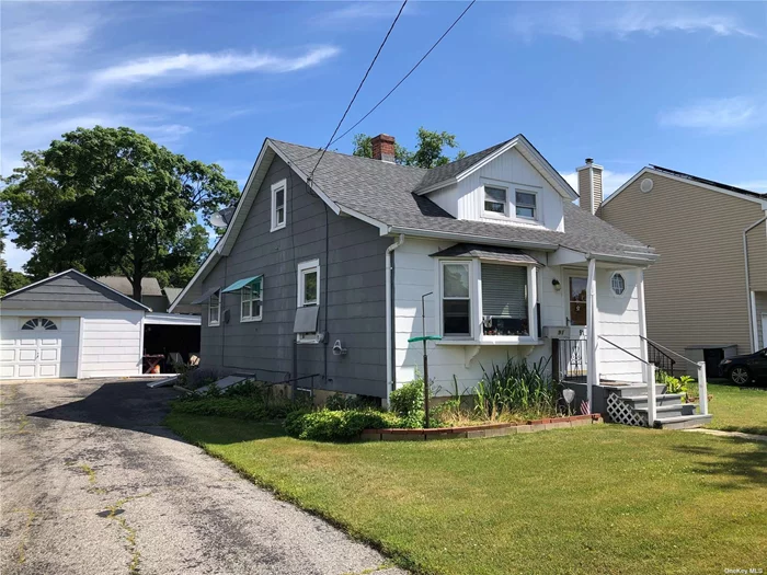 Great Opportunity for Starter or Finisher! 2 Bedrooms on first Floor with Large Expandable Attic, Full Basement, 2 Car Garage Plus a Carport, 75x125 Manicured Property, New Roof, Large Shed, Bilco Doors to Basement. Islip Schools and Amenities.
