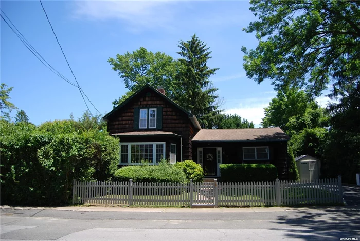 A 3 Bedroom Cape with 2 baths, Living Room, Eat-in Kitchen, Entry Foyer, full basement with storage and outside entrance and a covered porch with a private yard.