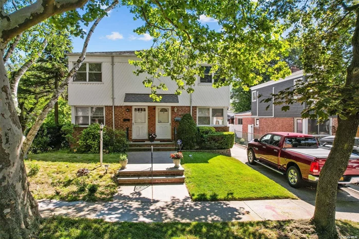 Spacious home in the highly desirable Oakland Gardens. Finished basement w/ separate entrance, hardwood floors, private driveway, updated kitchen and bathrooms. Q88, QM5, QM35, QM8 routes nearby.