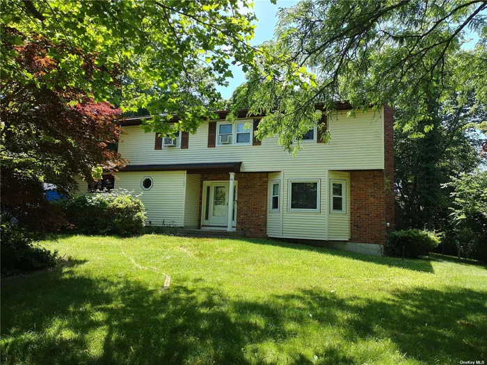 Large 4 Bedroom Colonial close to Port Jefferson with Hardwood floors, Recently installed Kitchen, New Windows all Large Bedrooms, Full Finished Basement & a 2 Car Garage..