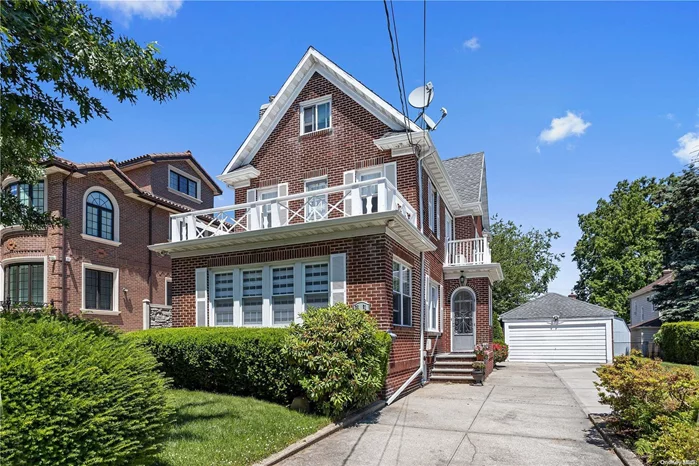 Spectacular brick colonial in the heart of Bayside on an oversized 60 x 100 lot. Located on a quiet tree-lined street 4 blocks from Bell Blvd and the LIRR. This fully renovated 4 bedroom, 3.5 bathroom home includes an expansive living room with fireplace, formal dining room, and large kitchen with pantry. Features include Brazilian cherry wood floors, split A/C units throughout, and a large finished basement and attic each with full bath. The property has a 2 car garage, and a private landscaped yard with deck. SD 26 - Convenient location to parks, highways, shopping, restaurants, etc.