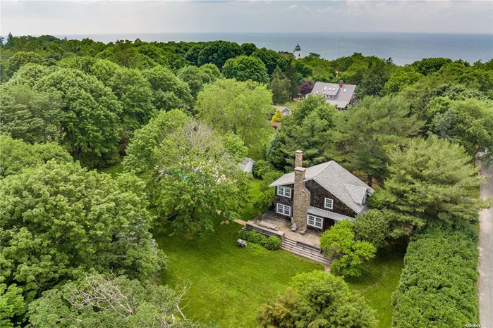 This charming 1927 shingled cottage is the epitome of New England charm and grace. Steps from Hortons Lighthouse and the Long Island Sound with Founders Landing Park District rights to both Sound and Bay beach. Sun drenched and one of a kind with 3 bedrooms, 2 bathrooms, 2 original field stone fireplaces, wainscoted sunporch doubling as a dining room. Outdoor shower and a 16x34 gunite pool placed to maximize the sun, a new addition to this private paradise. Incredible hydrangea trees and wisteria, you really need to see this before it&rsquo;s too late! Surrounded by North Fork renowned farm stands, restaurants, beaches, marinas, boating, award winning wineries and great shopping.