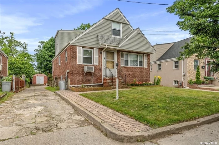 3 bed 2 bath charming cape with a basement and large yard located in the heart of inwood walking distance to shopping and lirr
