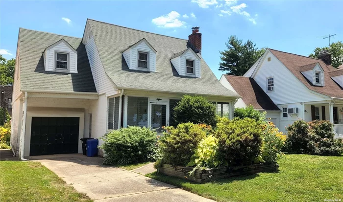 Endless Opportunities to Restore this Detached Colonial in Prime Bayside! Turn this Project into Your Forever Home. The First Floor Offers an Enclosed Porch, Living Room with Fireplace, Formal Dining Room, Eat-In Kitchen, Den, Half Bathroom and a One Car Attached Garage. The Upstairs Holds Three Bedrooms and One Full Bathroom. Full Open Basement, Sunny and Bright Yard, Conveniently Located Near Parks, Shops, Schools, and Transportation. Needs TLC, Won&rsquo;t Last!