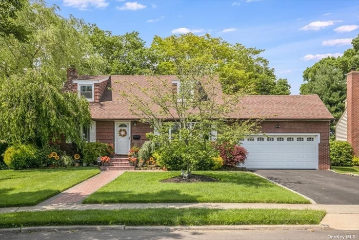 This Oversized Center Hall Expanded Cape Features All Spacious Rooms with 4 Bedrooms and 2 Full Baths Located on the Sought After Parkview Circle North which is a Quiet Cul-De-Sac that&rsquo;s Only a Very Short Walk to the Charming Hamlet of Bethpage with Lots of Restaurants and Shops, Library, Schools. Park, Playground and LIRR Station. This Home Features a Master BR on Main Level that can Accommodate a King Plus Second Main Level BR, Large EIK/Dining Room is Open to LR, Beautiful Hardwoods Throughout as Shown, Master Size Br on Second Floor Plus 4th BR or Home Office, Family Fun Finished Spacious Basement has a Separate Utility and Laundry Area, Oversized Private Rear Yard That is Your Own Oasis of Horticultural Tranquility, New Windows , Roof, Gas Hot Water Heater, Custom Brick Walk & Stoop, Updated Gas Heat 5yrs Young New Sewer Line, GAS Cooking, 2 Car OS Attached Gar is a Rare Find, Conveniently Located and All Lovingly Cared for. Taxes Do Nor Include Additional STAR Savings of $1213.