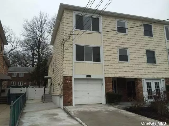 Brand new large Triplex with garage. Near Bay Terrace Shopping Center area of Bayside. Apartment newly renovated. 3 levels living space. Over 1800 sq. ft. Hard wood floors throughout. 3 bedrooms, 2.5 baths, office. Easy access to all transportation, LIRR to Penn Station, Express Bus to Manhattan. Fenced back yard. Great location. Walk to Fort Totten Park by the water.