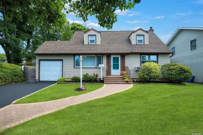 Welcome to this expanded cape in Radcliff Manor! Totally renovated kitchen in 2015 includes top end Professional Series Stainless Steel appliances, Fine Custom Cabinetry by Woodmore, granite counter tops and oversize windows with entrance to both deck and patio. Gas propane 6 burner cooktop. The eat in kitchen has an open floor plan encompassing the dining room. Large master bedroom with ample closets on main floor, renovated bath plus an additional bedroom. The second floor has a full bath, and hallway with closets, and 2 additional bedrooms. The full heated basement is partially finished with laundry room, workbench, utilities and storage. Fully equipped generator system in basement. Stand alone gas generator is excluded. One car garage features loft and access to back yard. Lawn sprinkler and Alarm Systems.