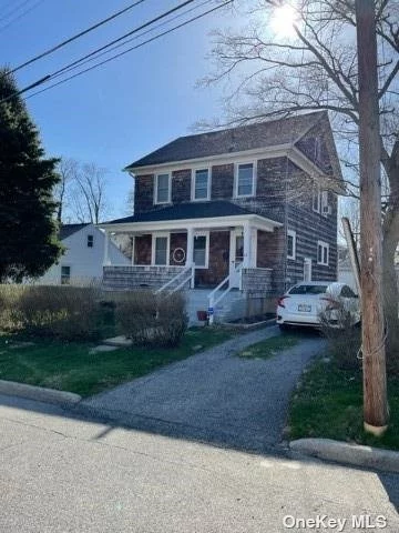 Beautifully renovated colonial. Large living room and dining room, renovated kitchen, half bath and mud room. 2nd floor 3 beds, full bath and walk up attic. Full basement. Long driveway for parking. Lovely front porch and back patio.