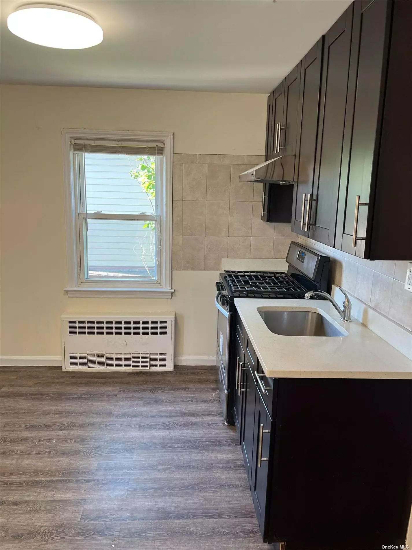 Newly Renovated Two Bedroom Apartment. Brand new Kitchen With Granite Counter Top And Stainless Steel Appliances. Heating Included. Close To Shopping, Public Transportation (Q36, Q46, Qm6 & Qm36) And Major Highway. Best Little Neck School District (Ps186, Ms67), A Must See.