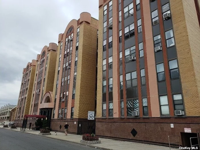 Spacious 2 Bedroom Condo. Hardwood floors throughout. Updated Kitchen with stainless appliances, Beautiful cabinets. Updated tile bath. Across from beach and close to LIRR. Pets allowed. Laundry & gym on premises. Waitlist for parking. If there is parking available the cost is $85 per month. Common charges and assessments are being verified. All information to be verified.