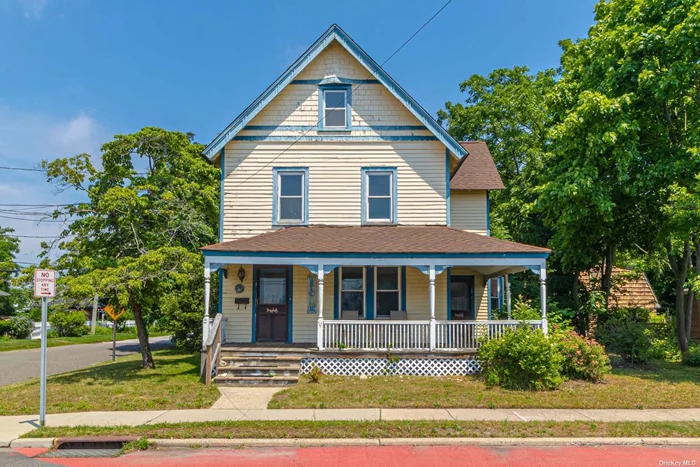 Beautiful Victorian Circa 1920 featuring Wraparound Porch, Formal Living Room, Formal Dining Room, Large Kitchen with Granite Counters. 5 large bedrooms, 2 full baths, unfinished basement, 3rd floor Walk up Granny Attic with 5th Bedroom and Office, 2 Zone oil heat, Central Air, detached 2 car garage/barn, corner property! Low Taxes $9800 Before Basic Star Rebate! Close to Town, Train, and Beach!