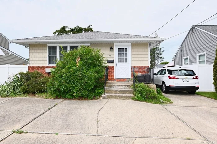 Tremendous value needing some TLC. Ranch home with 3 bedrooms cabinet filled kitchen. dining room, Full finished basement with outside entrance.detached garage. Close to Parks, shopping schools and other amenities. Close to Long Island RR station.