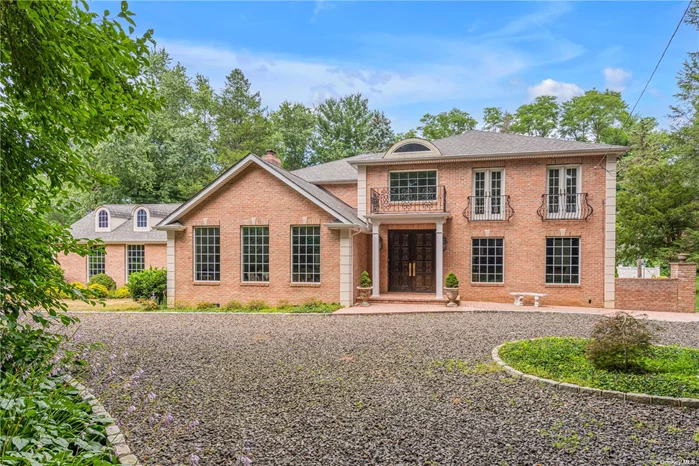 Stately and traditional brick colonial on 2 acres in the Village of Upper Brookville. Located on Piping Rock Rd, one of the most beautiful streets on all of the North Shore. As you step inside you are welcomed by a grand marble entrance foyer with lots of natural light. A separate wing of the home features a gracious Music Room, gallery and den with onyx fireplace. Updated kitchen opens to breakfast area leading to Sun Room and backyard. Host dinner parties in the formal dining room adjacent to the living room with large windows. 5 bedrooms and 3 baths. Includes two bedrooms on the first floor or use one as an office. The exterior has an expansive patio, gardens, inground pool and level fenced grounds. Oversized 2.5 car garage. Private backyard setting. This home provides the owner with spacious rooms, a great layout flow and terrific options for entertaining. Still time to be in this Summer. Locust Valley School District and close to private schools too. Quality construction in 2015.