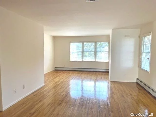 Large 2 Bedroom Apartment with Generous Sized Rooms. Hardwood Floors, Basement w/.5 Bath, Washer/Dryer and Garage. Conveniently Located Directly Across From Manorhaven Community Park, Beach and Pool. NO PETS.