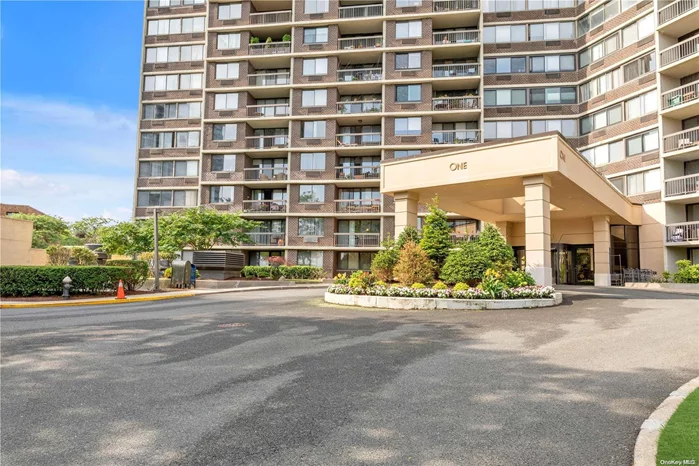 This Luxurious Hi-Rise condominium is located in the heart Bayside&rsquo;s Bay Terrace. Your very own private balcony overlooking manicured grounds with spectacular views of the North Shore Long Island Sound and Throgs Neck Bridge.This spacious apartment features a Living Room / Dining Room with balcony access, an eat in Kitchen with wood cabinets, granite counter tops, stainless steel appliances and an island with counter top seating.The bedroom large enough for a King Size Bed with a large walk in closet. This 897 Sq Ft of living space has wood floors throughout and tiled bathroom.This gated community offers 24 hour security , concierge service, indoor heated pool. The Fitness center offers a gym, outdoor tennis and indoor basketball courts. Restaurant, dry cleaners and market are located in lower levels. Indoor parking is available for monthly and short term parking ..Minutes to Bay Terrace shopping, NYC direct and local bus lines. Local highways with bridge access and LIRR service.