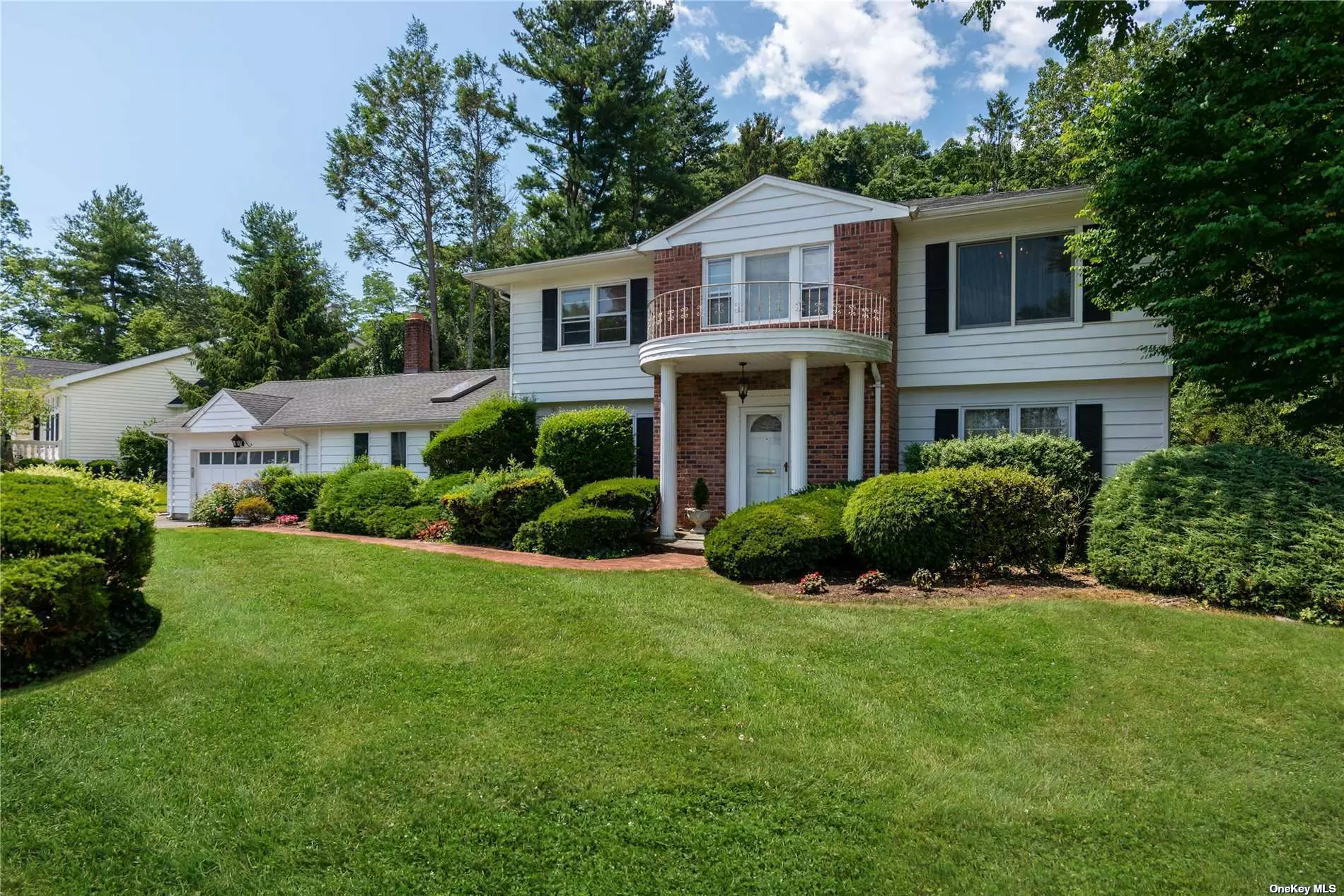 Rare Find This Expanded 5 Bedroom 3.5 Baths Central Hall Colonial On A Large Flat, Fenced, Private Parklike Property Over 1/2 Acre In Country Estates. Features: 2 Dens With Wood Burning Fireplaces, Cathedral Ceiling, Skylights, 7 Yr Old Roof, Roslyn Schools, Access to East Hills Park. Close To All.