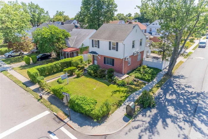 A corner colonial House located in the quiet neighborhood of Fresh Meadows. Move-in Condition. This home is approximately 4000sf in lot size. First floor features a foyer, living room, an open Kitchen w/granite counter-tops and custom cabinets that are paired with stainless steel appliances, a dining room, sunroom with vented skyline windows, and a half bath! Second Floor consists of three good sized bedrooms, and a full bathroom. Full finished basement with lots of storage space. Split AC, brick paved and fenced backyard, split AC and much more!! Express buses to Manhattan. Q17, Q88, Q30, Q31. Close to shopping, schools and highways. SD # 26. PS173, JHS216