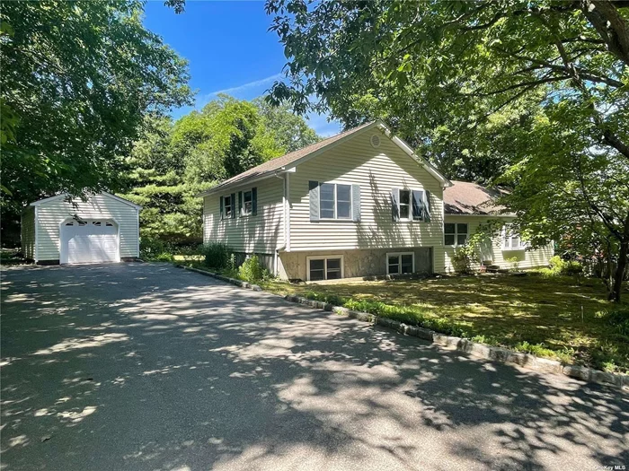 2150 Sq ft Split Level on a 1/2 acre with a 1 car detached Garage. Andersen Windows, Vinyl siding, wood burning stove, central Vac, basement for additional storage. Private back yard, plenty of room for extended family.