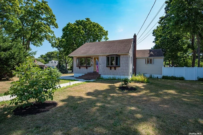 Charming cape with a bright open floor plan. Featuring Living room, formal dining room & kitchen. Harwood floors on under carpet downstairs. Three bedrooms, two full baths. Situated on shy half acre property with a two car detached garage. This home is for you!!