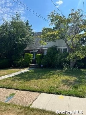 THIS BRICK CAPE FEATURES 4 BEDROOMS, 2 BATHS, LR W/ FIREPLACE, DR, EIK, AND FULL BASEMENT WITH OUTSIDE ENTRANCE AND HIGH CEILINGS! GREAT FOR A LARGE FAMILY! UNIONDALE SCHOOLS! NEEDS TLC! WILL NOT LAST!
