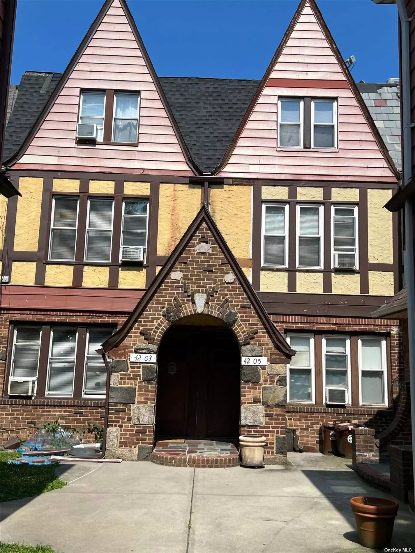 Cozy Tudor Style One Bedroom Duplex Unit in Prime Bayside/Flushing Location. First Floor Features and Eat in Kitchen and Bedroom or Living Room, Lower Level Could be Living Or Bedroom Space and Full Bath. Tenant Responsible for All Utilities, Landlord Pays Water Bill - Video Available on Request