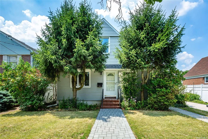 Charming Cape-Cod in the Heart of New Hyde Park. Features 4 Bedrooms and 2 Full Baths.